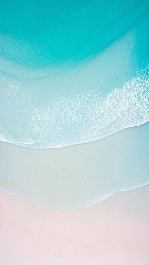 Astonishing aqua ocean seashore iPhone 11 wallpaper.