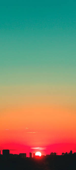 Wallpaper ng kalangitan ng teal at pulang paglubog — 1080x2400 Wallpaper