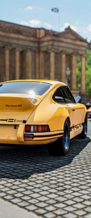 Yellow Porsche 911 Parked Outside — Motorola Razr Wallpaper