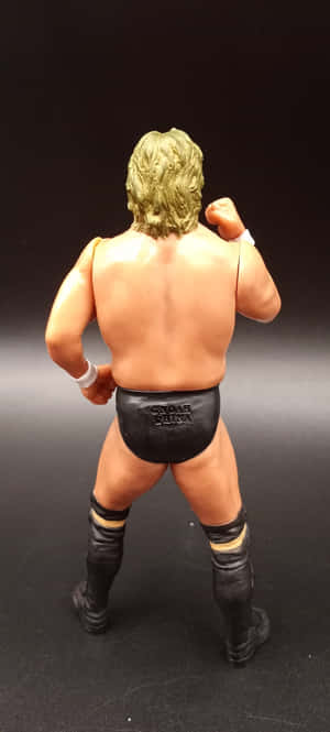 Yoshihiro Takayama Statue Facing Backward — Pixel 11 Wallpaper